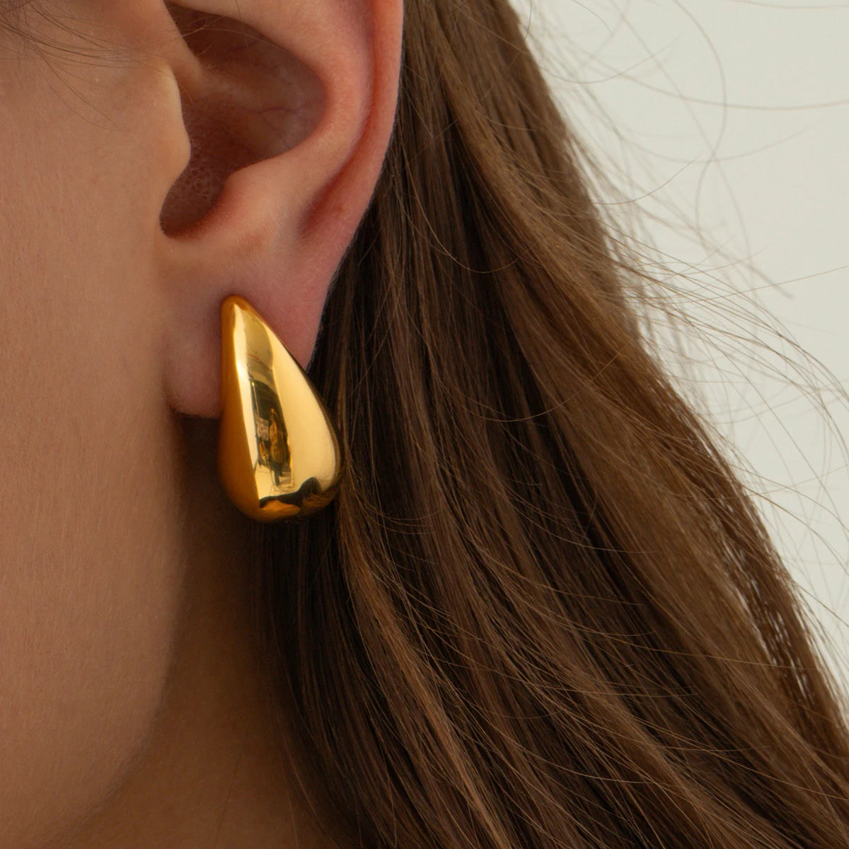 Golden Tear Drop Stud Earrings